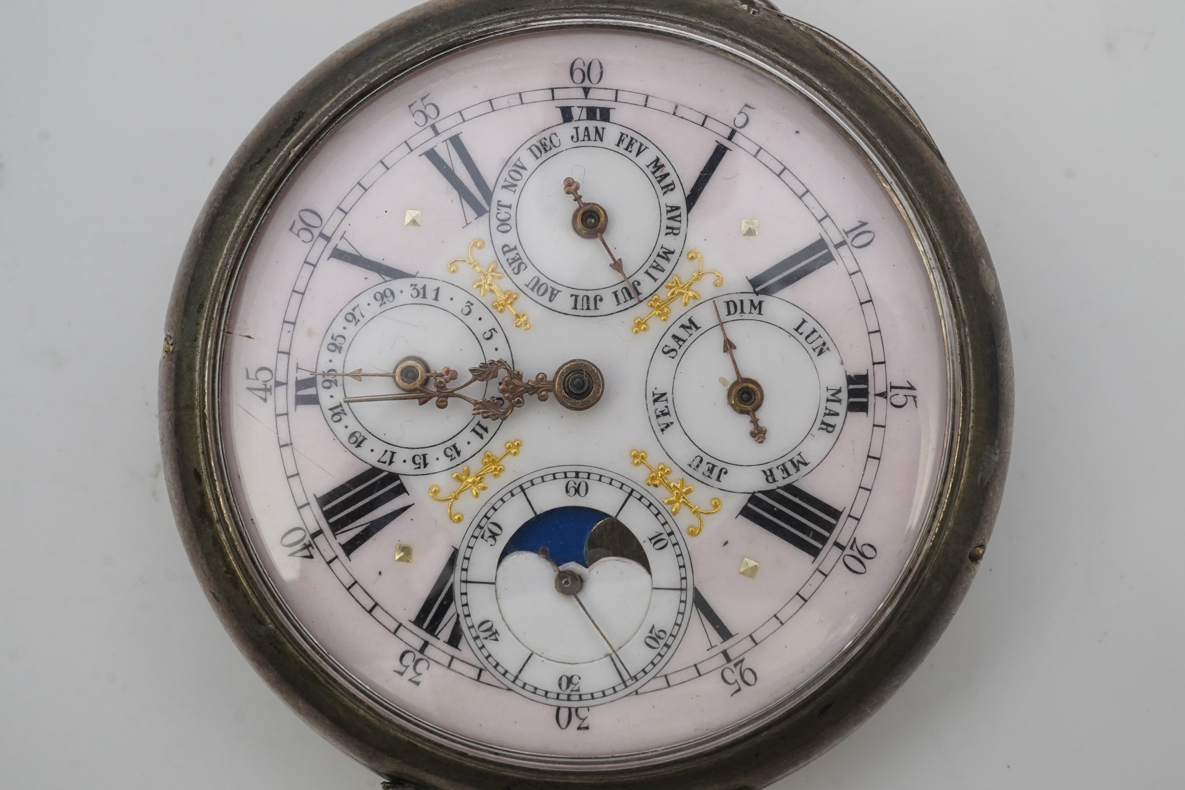 A large early 20th century German 800 standard silver open faced calendar moon phase keyless pocket watch